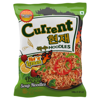 A green packet of Current Hot 'n' Lemon Veggie Soup Noodles by Yashoda Foods. The packet shows a picture of the noodles with vegetables.