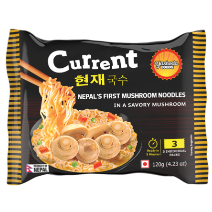 A black packet of Current Mushroom Noodles by Yashoda Foods. The packet shows a picture of the noodles with mushrooms and chopsticks.