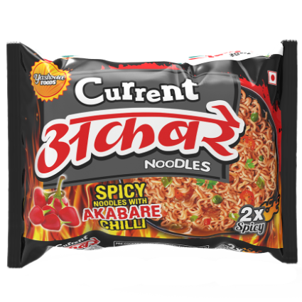 A red and black packet of Current Akabare Chilli Noodles by Yashoda Foods. The packet shows a picture of the noodles and chilli peppers.